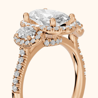 Austin Three-Stone Halo Oval Diamond Engagement Ring in Rose Gold - slant-view.webp