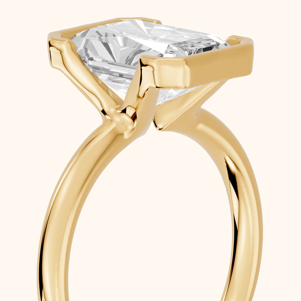 Winslow Partial Bezel Solitaire Radiant Diamond Engagement Ring in Yellow Gold - slant-view.webp