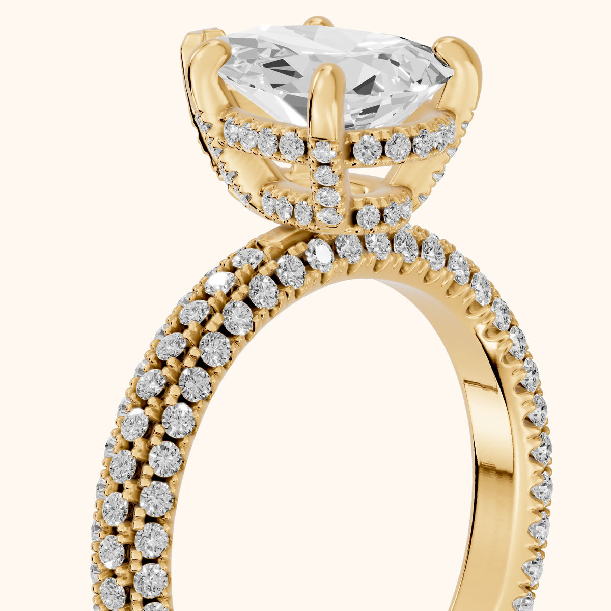 Mira Hidden Halo Micropavé Pear Diamond Engagement Ring in Yellow Gold - slant-view.webp