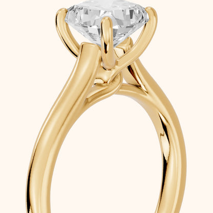 Emeline Solitaire Cathedral Cushion Diamond Engagement Ring in Yellow Gold - slant-view.webp