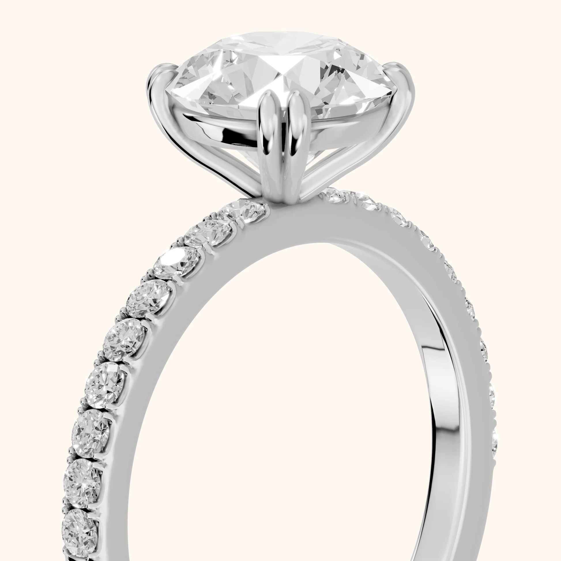 Novara Solitaire Pavé Round Diamond Ring in Platinum - slant-view.webp