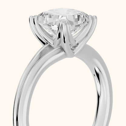 Neve Solitaire Split Shank Cushion Diamond Engagement Ring in Platinum - slant-view.webp