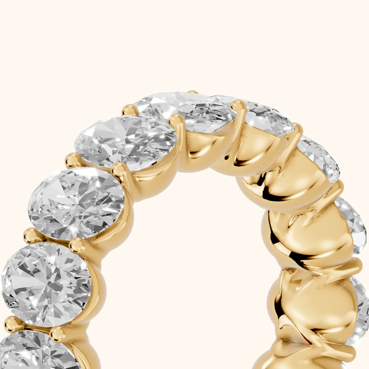 Flavia Shared Prong Oval Diamond Eternity Band in Yellow Gold - slant-view