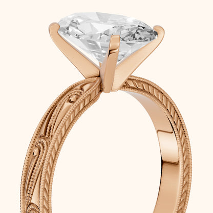 Abbie Engraved Solitaire Oval Diamond Engagement Ring in Rose Gold - slant-view.webp