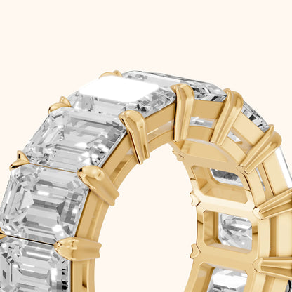 Odessa Shared Prong Emerald Diamond Eternity Band in Yellow Gold - slant-view