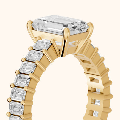 Mallory Shared Prong Emerald Diamond Engagement Ring in Yellow Gold - slant-view.webp