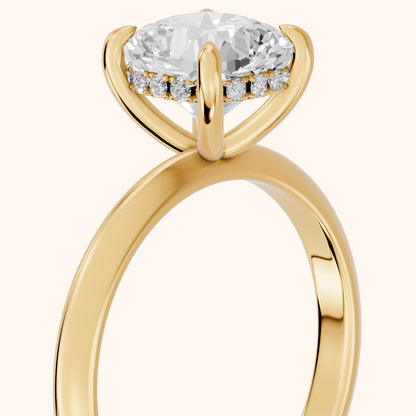 Amaya Hidden Halo Cushion Diamond Engagement Ring in Yellow Gold - slant-view.webp