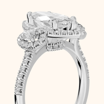 Austin Three-Stone Halo Marquise Diamond Engagement Ring in White Gold - slant-view.webp