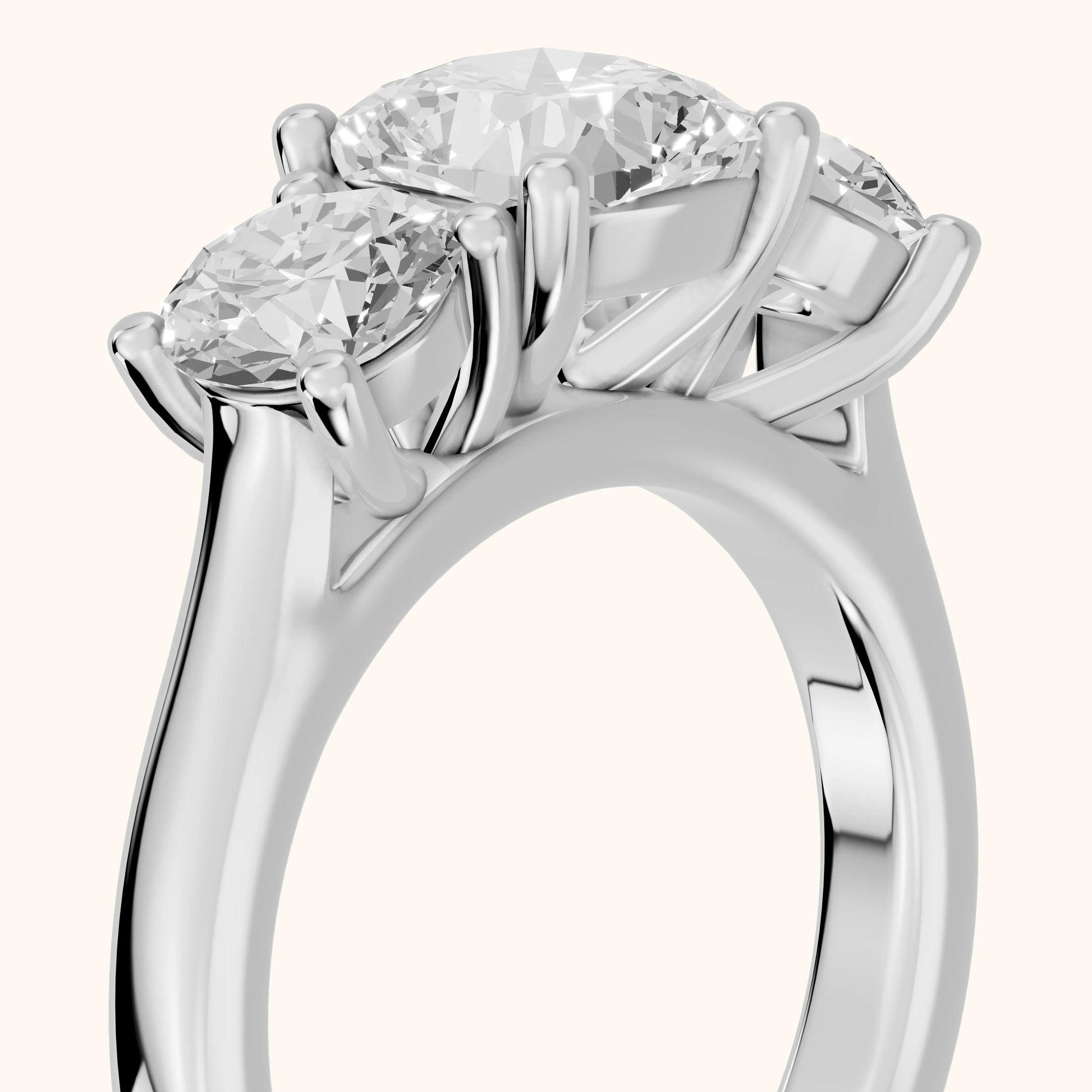 Callie Three-Stone Trellis Cushion Diamond Ring in Platinum - slant-view.webp