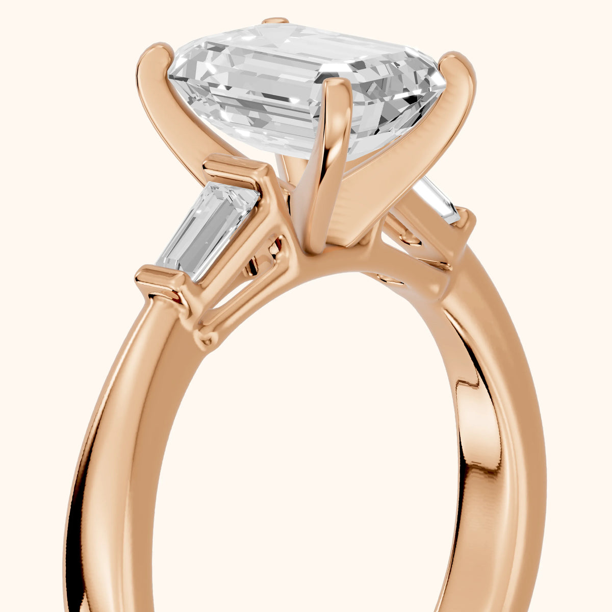 Jacinta Baguette Three-Stone Emerald Diamond Engagement Ring in Rose Gold - slant-view.webp
