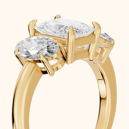 Lila Three-Stone Radiant Diamond Engagement Ring in Yellow Gold - slant-view.webp