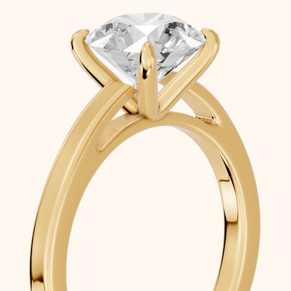 Kaia Solitaire Round Diamond Ring in Yellow Gold - slant-view.webp