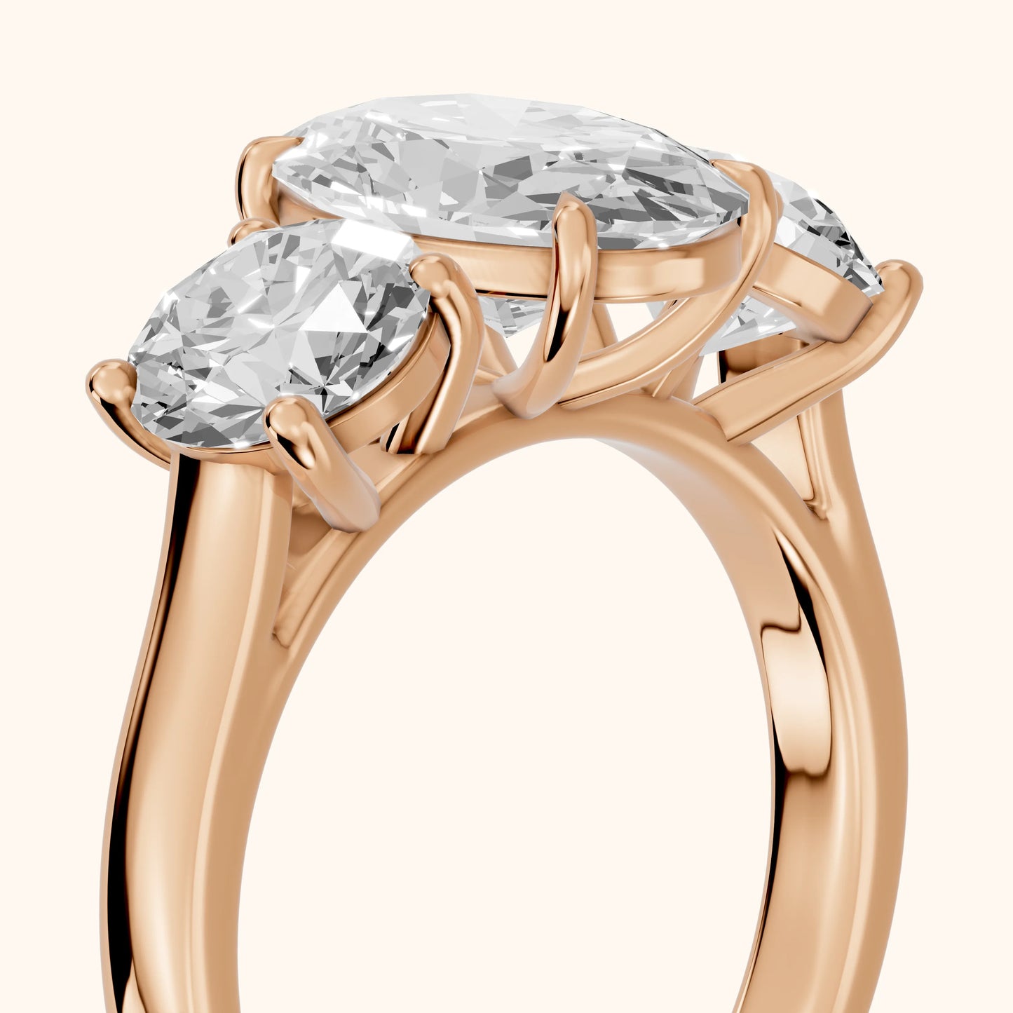 Esme Three-Stone Tapered Oval Diamond Ring in Rose Gold - slant-view.webp