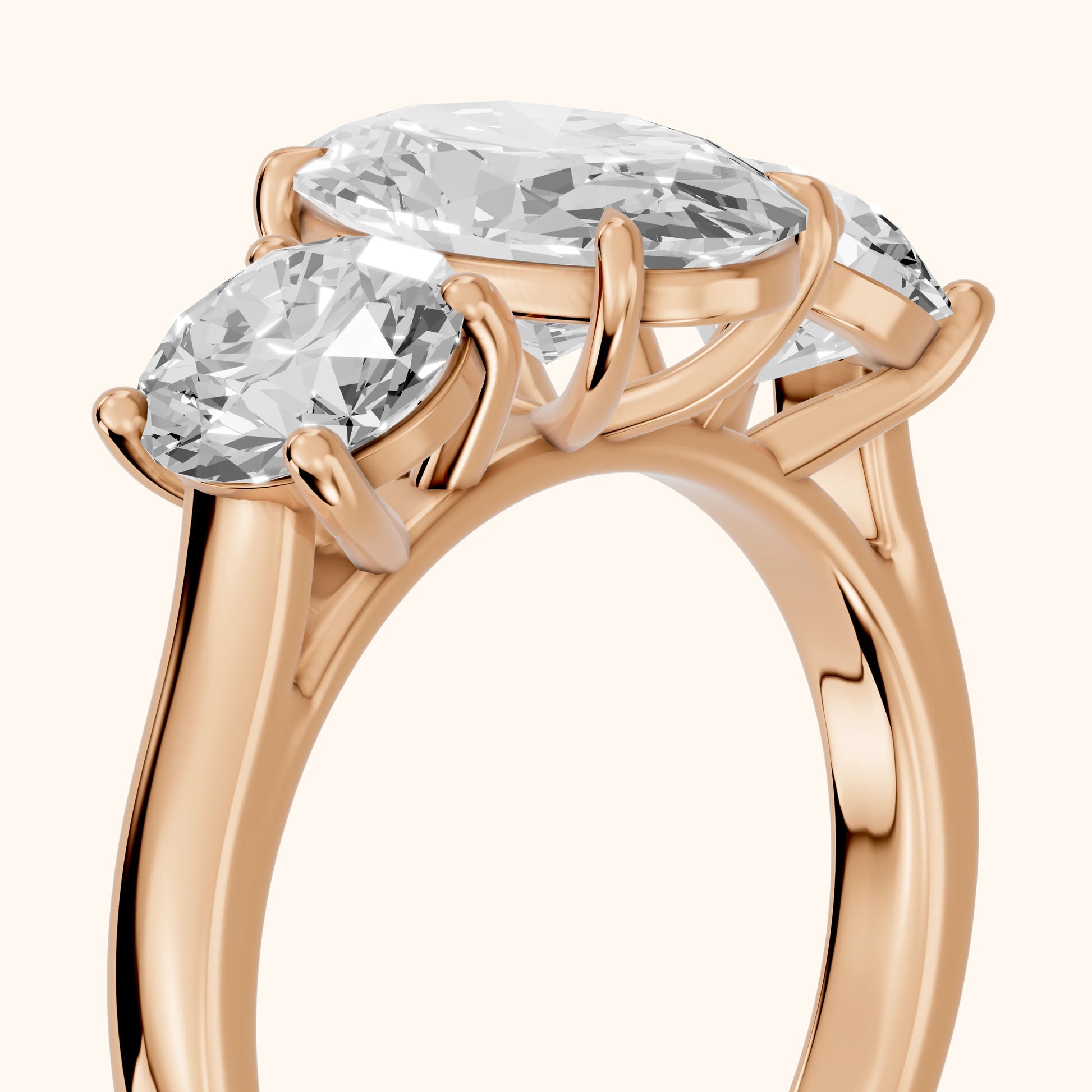 Esme Three-Stone Tapered Oval Diamond Ring in Rose Gold - slant-view.webp