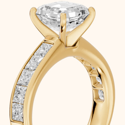 Sonoma Wide Band Channel Set Asscher Diamond Engagement Ring in Yellow Gold - slant-view.webp