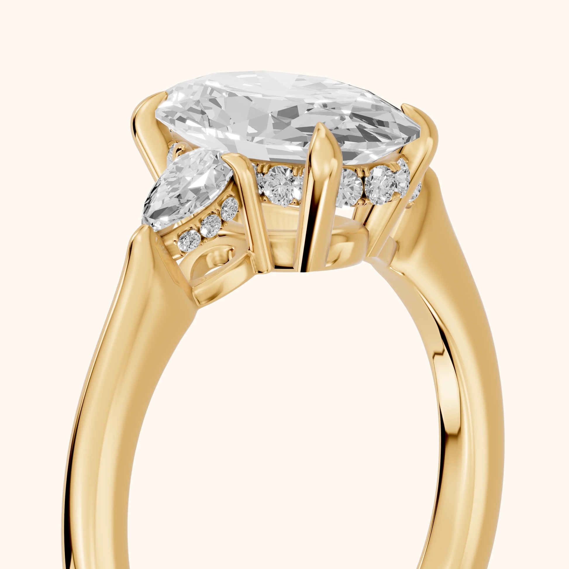 Leila Three-Stone Oval Diamond Engagement Ring in Yellow Gold - slant-view.webp