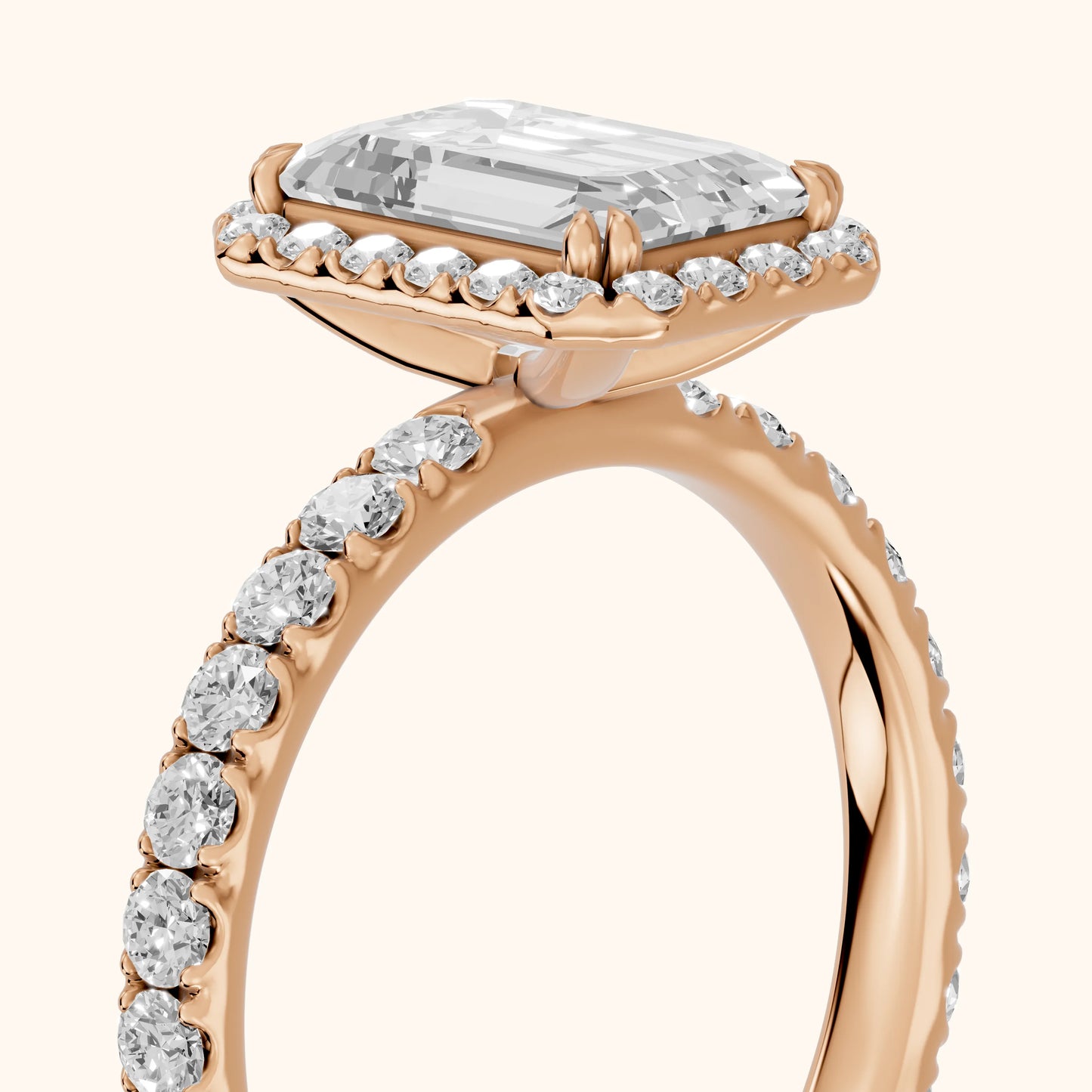 Chloe Halo Pavé Emerald Diamond Ring in Rose Gold - slant-view.webp