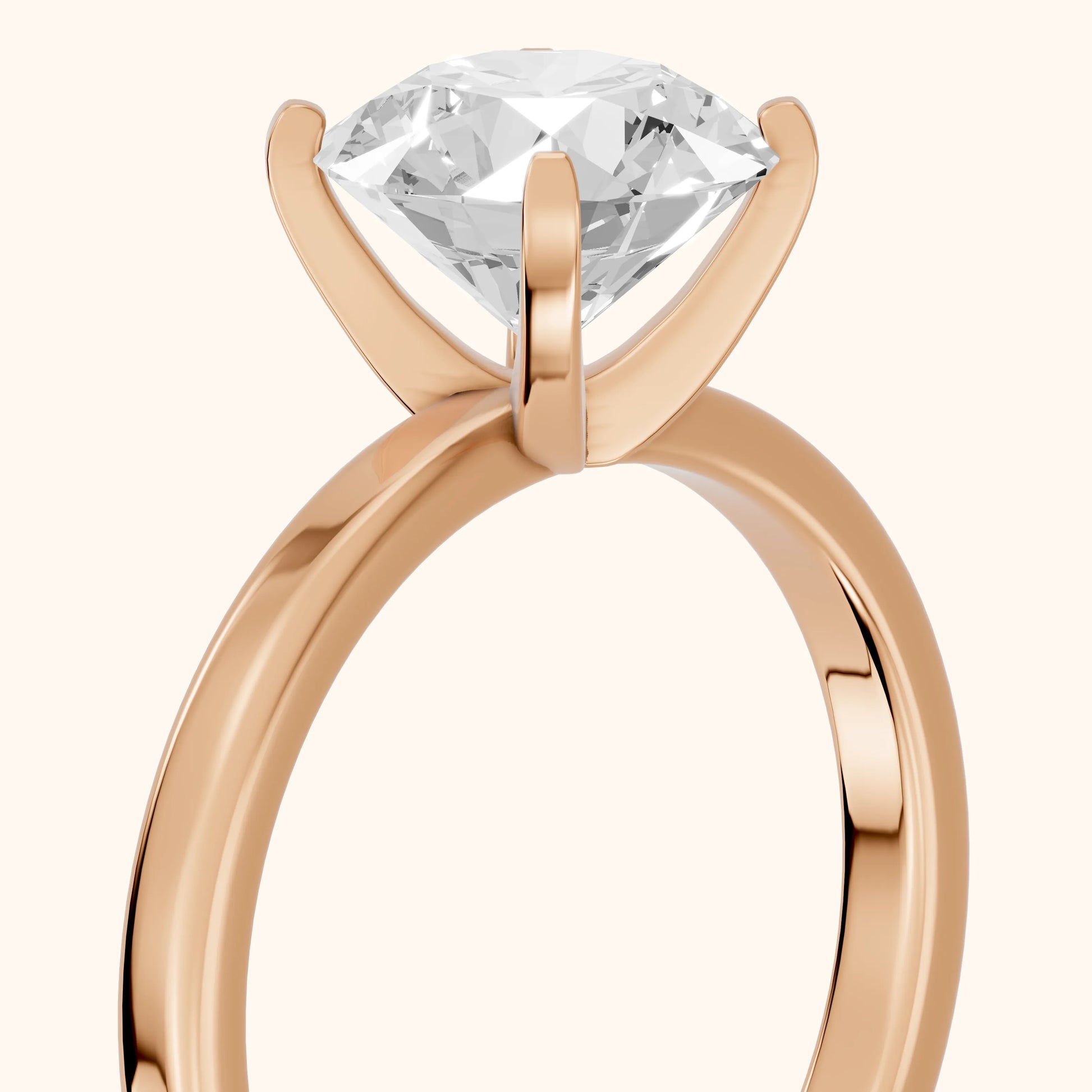 Liana Solitaire Claw Prong Round Diamond Engagement Ring in Rose Gold - slant-view.webp
