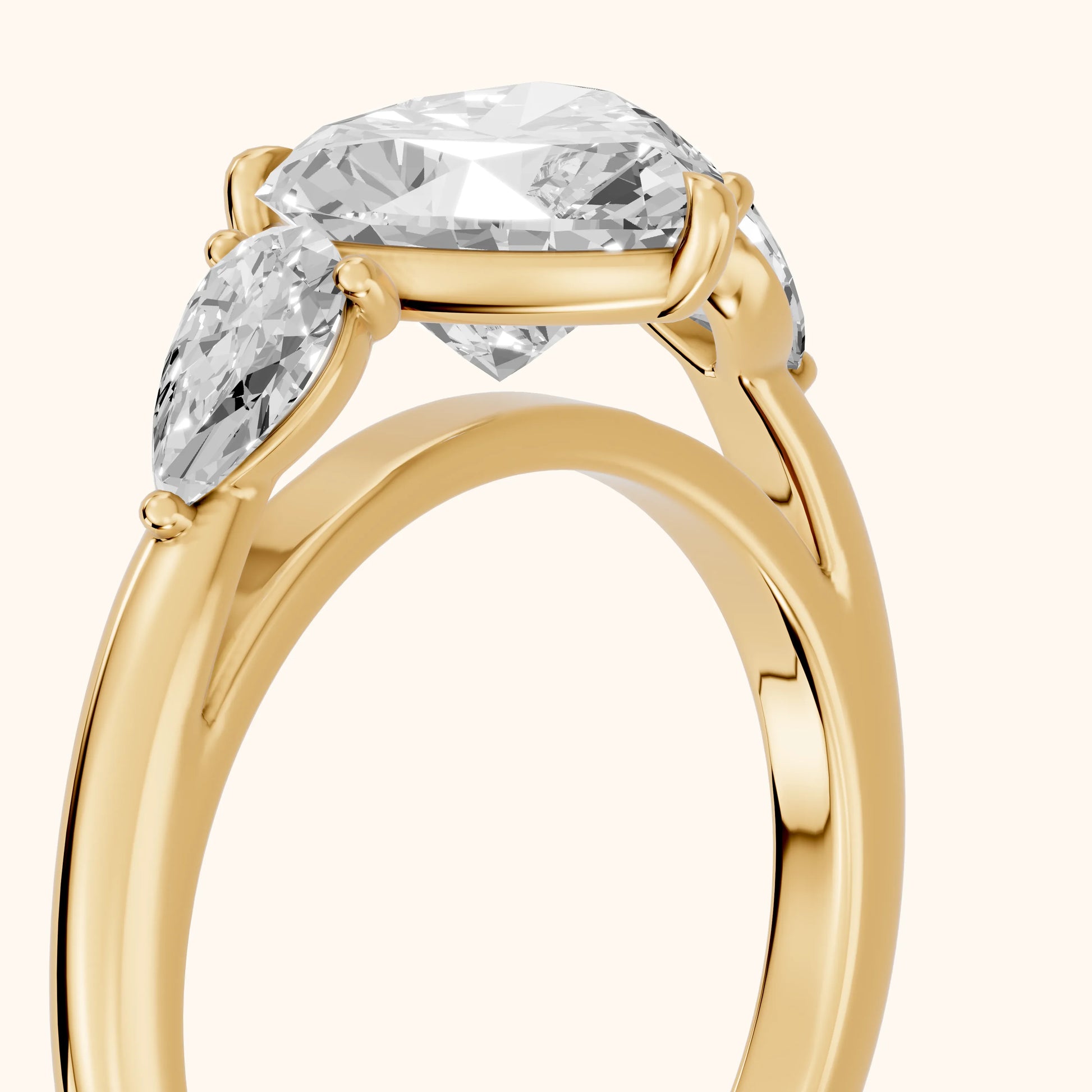 Phoebe Three-Stone Heart Diamond Ring in Yellow Gold - slant-view.webp