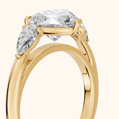 Phoebe Three-Stone Heart Diamond Ring in Yellow Gold - slant-view.webp