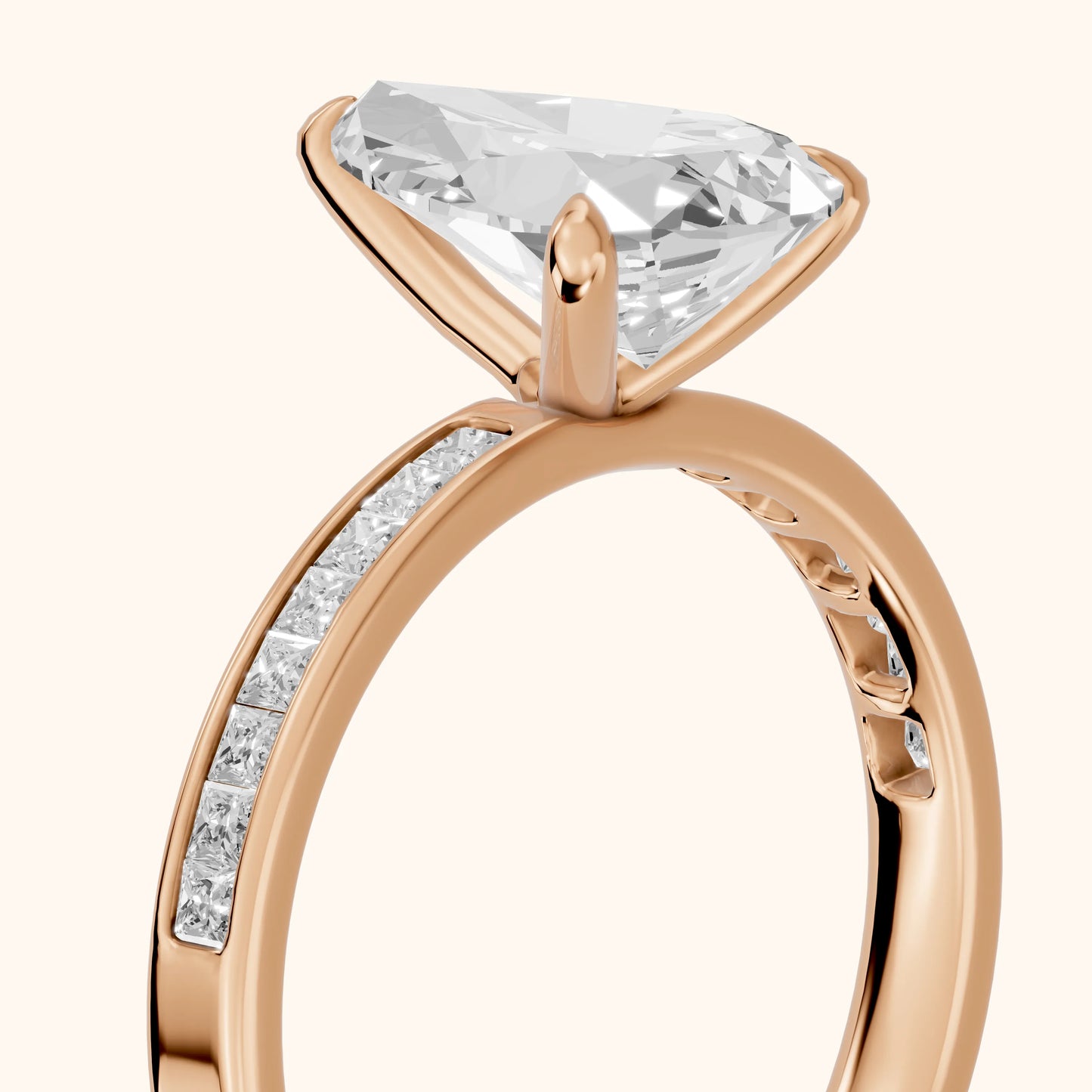 Maren Sidestone Channel Set Pear Diamond Engagement Ring in Rose Gold - slant-view.webp