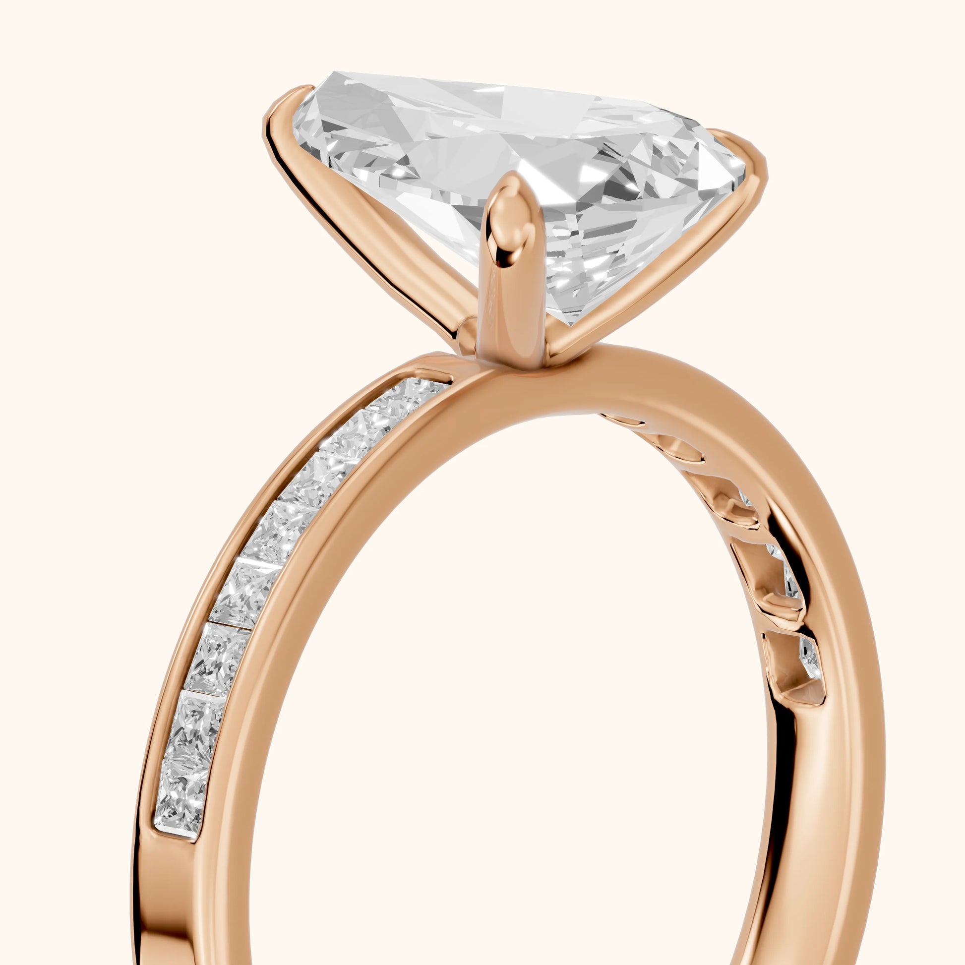 Maren Sidestone Channel Set Pear Diamond Engagement Ring in Rose Gold - slant-view.webp