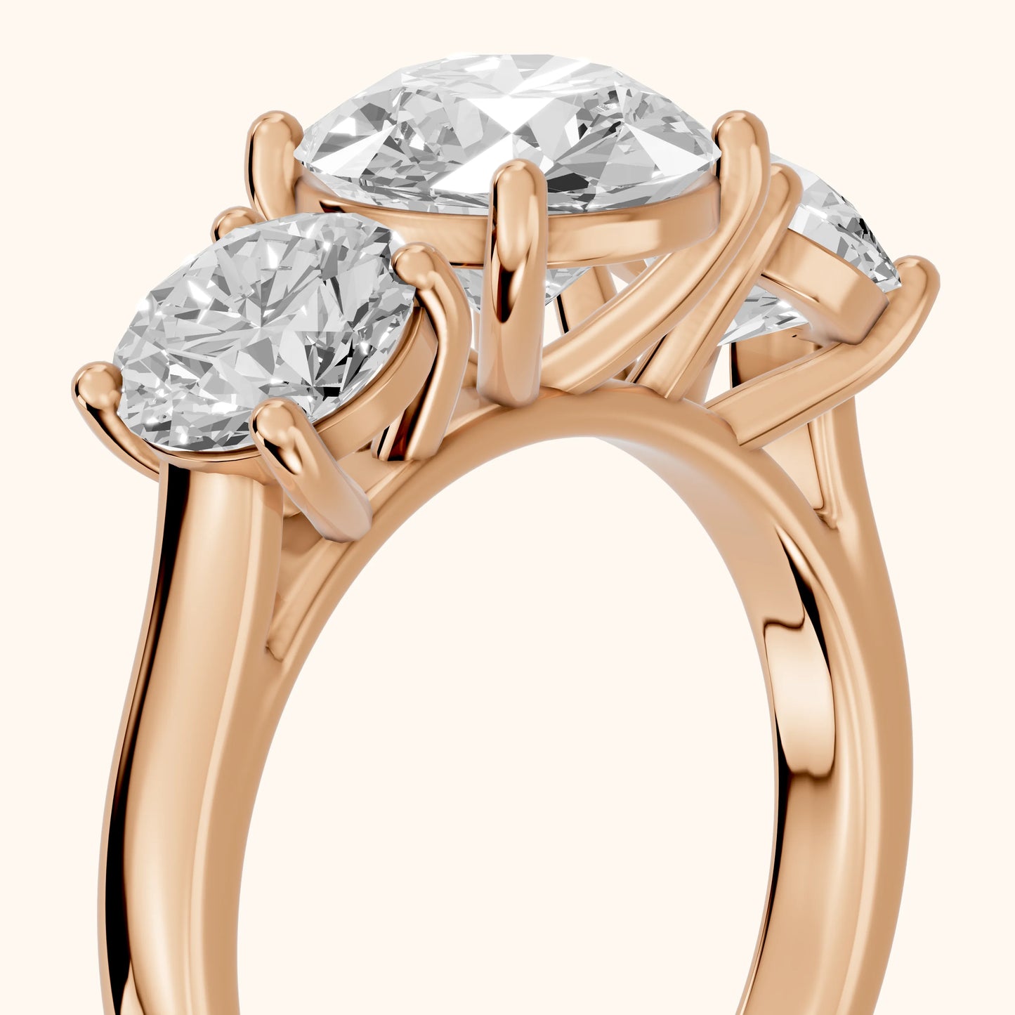 Esme Three-Stone Tapered Round Diamond Ring in Rose Gold - slant-view.webp
