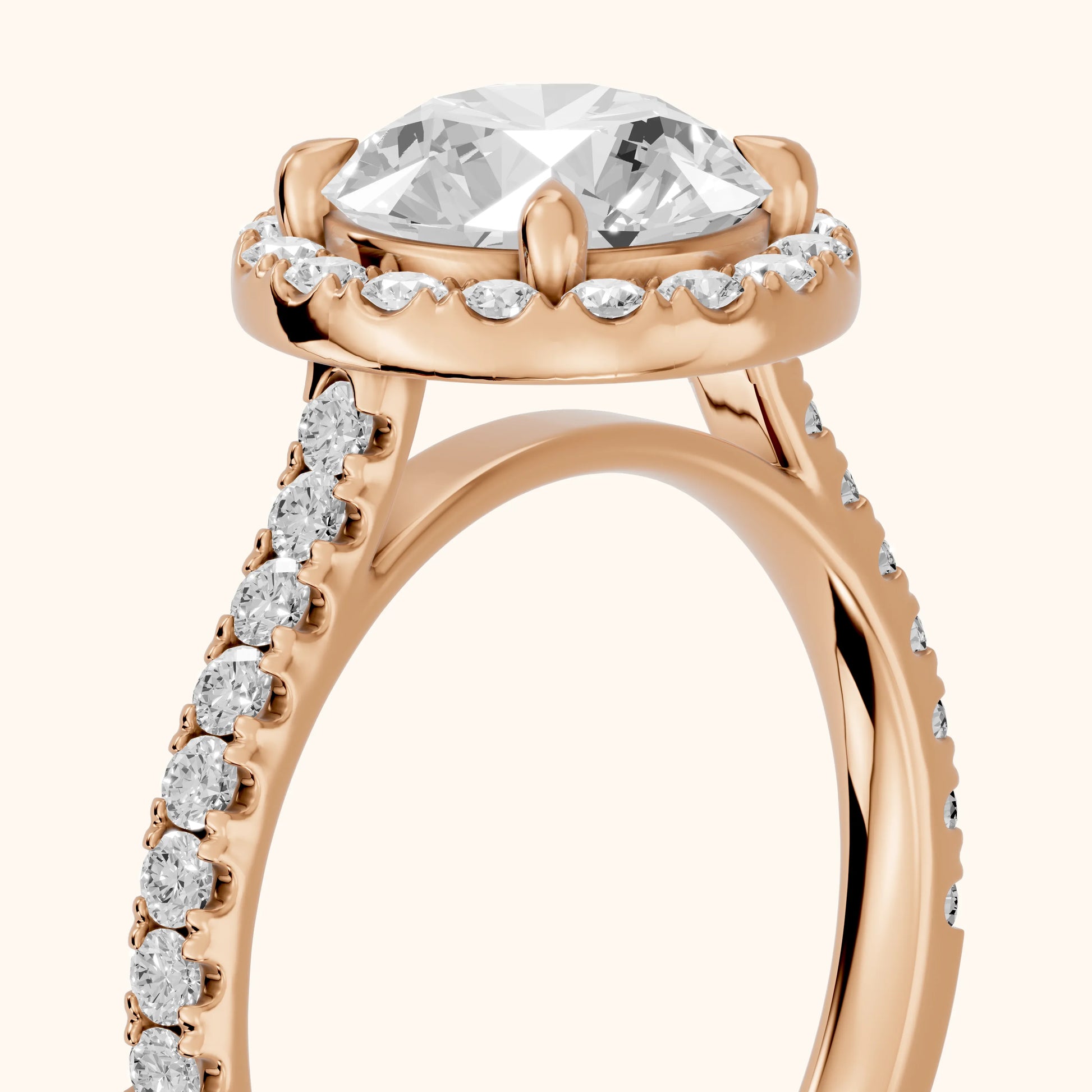 Amara Halo Claw Prong Round Diamond Ring in Rose Gold - slant-view.webp