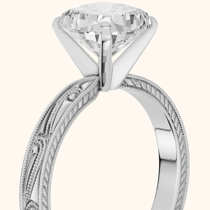 Abbie Engraved Solitaire Cushion Diamond Engagement Ring in Platinum - slant-view.webp