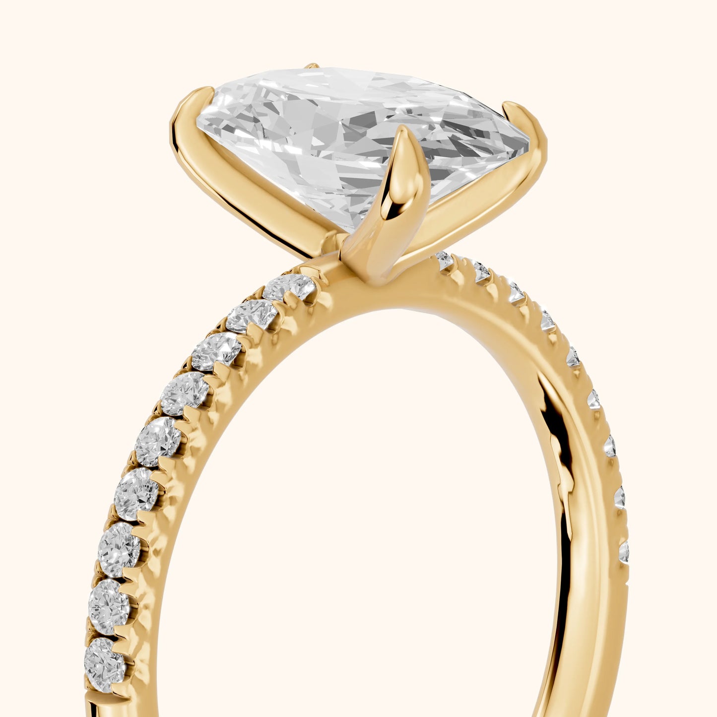 Ione Solitaire Pavé Oval Diamond Engagement Ring in Yellow Gold - slant-view.webp