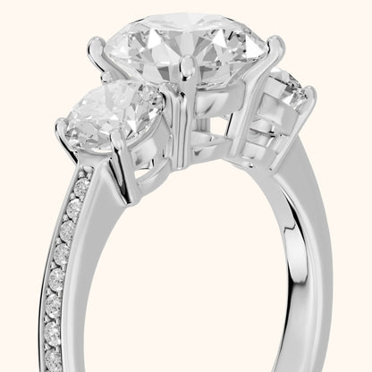 Brianna Three-Stone Pavé Round Diamond Engagement Ring in White Gold - slant-view.webp