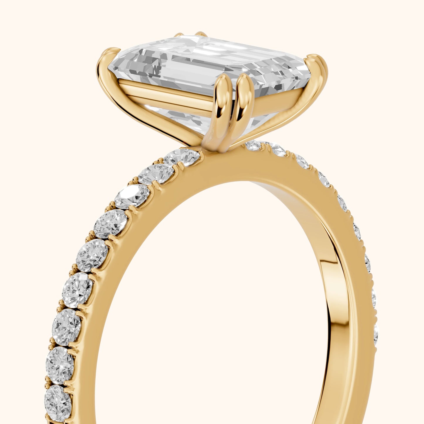 Novara Solitaire Pavé Emerald Diamond Ring in Yellow Gold - slant-view.webp