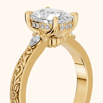 Siesta Three-Stone Engraved Cushion Diamond Engagement Ring in Yellow Gold - slant-view.webp