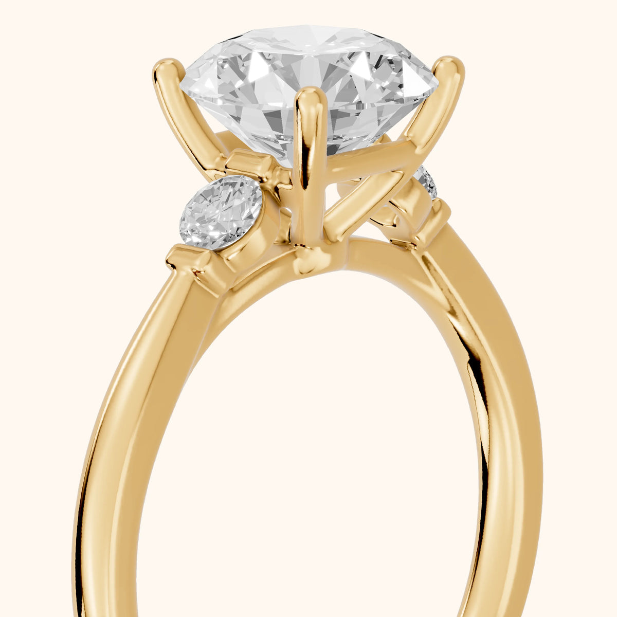 Micaela Three-Stone Round Diamond Engagement Ring in Yellow Gold - slant-view.webp