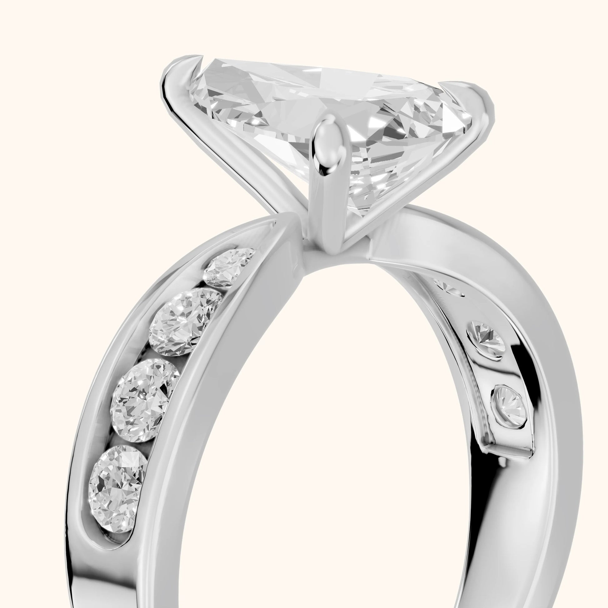 Noor Channel Set Sidestone Pear Diamond Engagement Ring in Silver - slant-view.webp