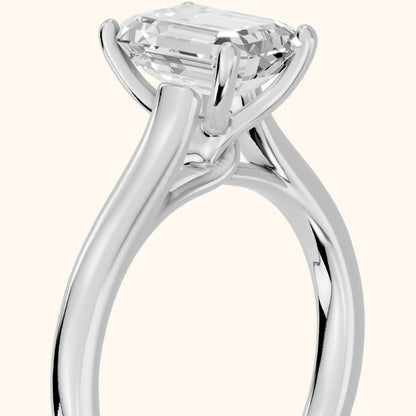 Emeline Solitaire Cathedral Emerald Diamond Engagement Ring in Platinum - slant-view.webp