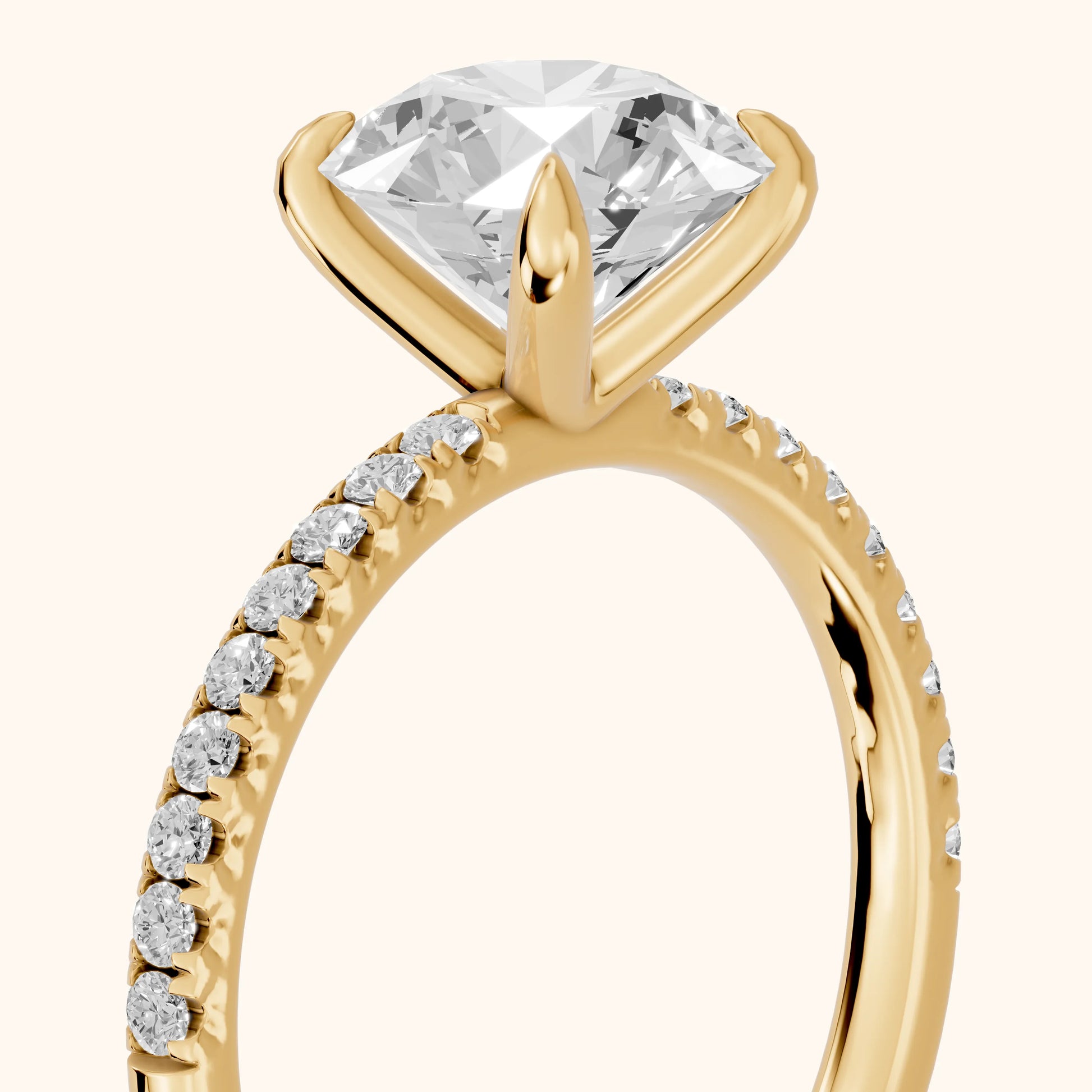 Ione Solitaire Pavé Round Diamond Engagement Ring in Yellow Gold - slant-view.webp