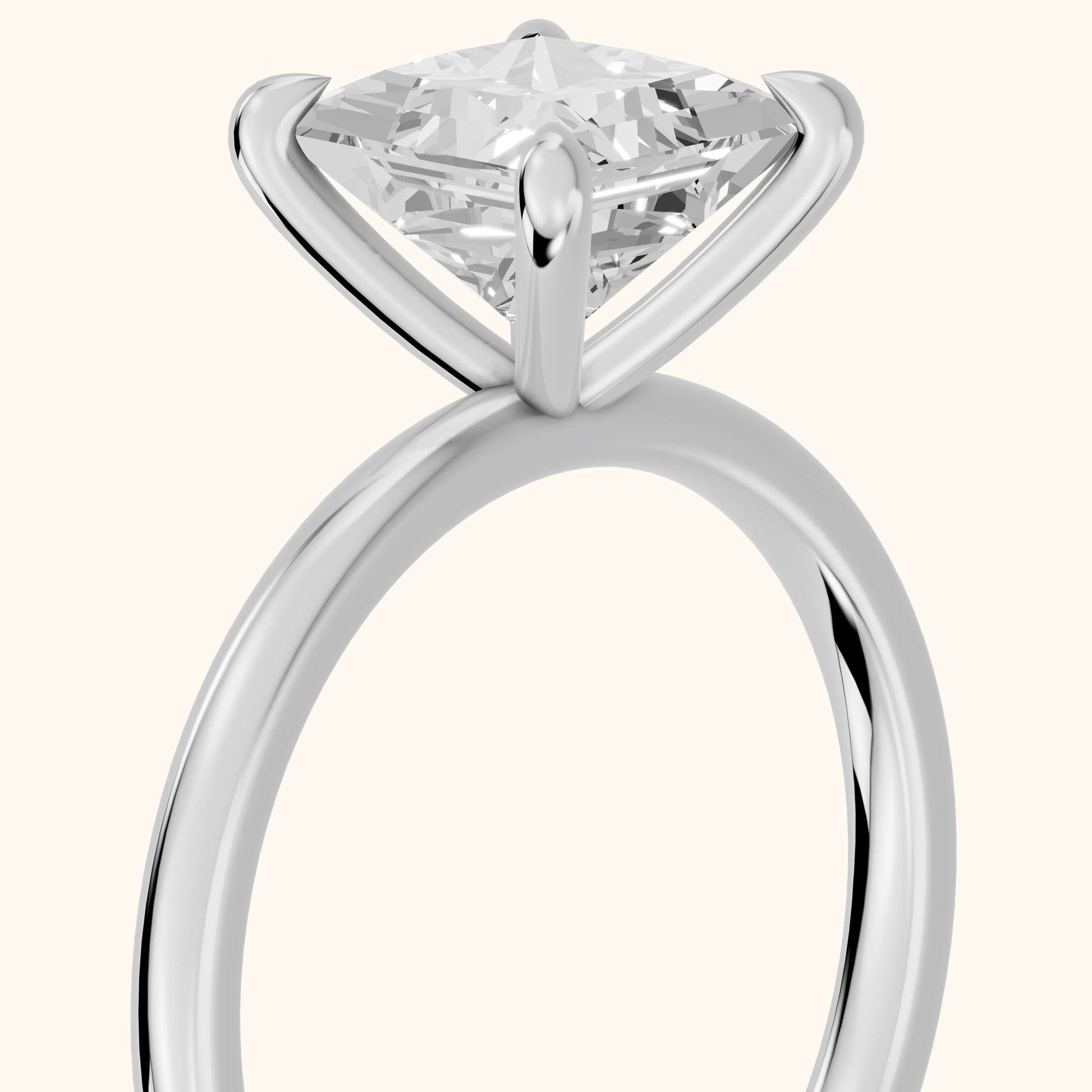 Nella Petite Solitaire Princess Diamond Engagement Ring in Platinum - slant-view.webp