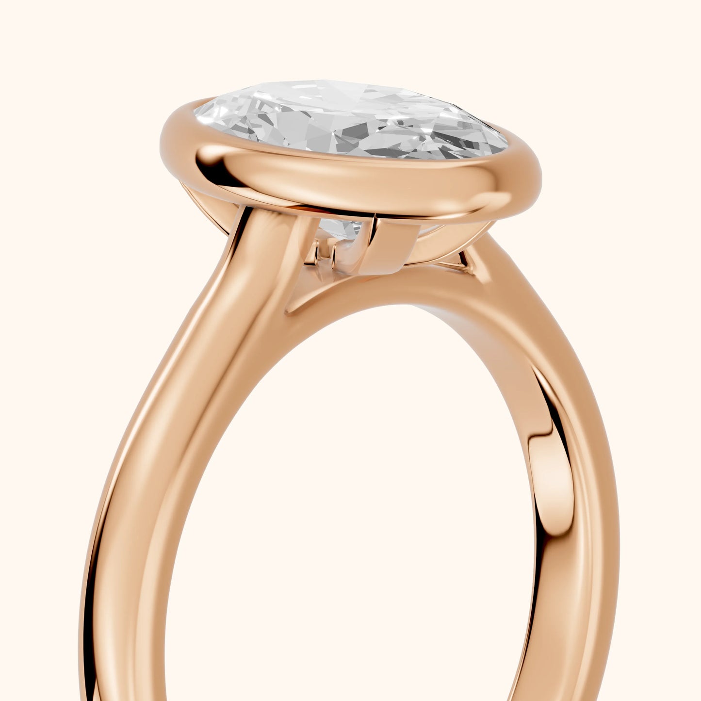 Jolie Bezel Solitaire Oval Diamond Engagement Ring in Rose Gold - slant-view.webp