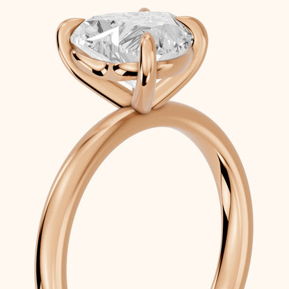 Solvang East-West Solitaire Heart Diamond Engagement Ring in Rose Gold - slant-view.webp