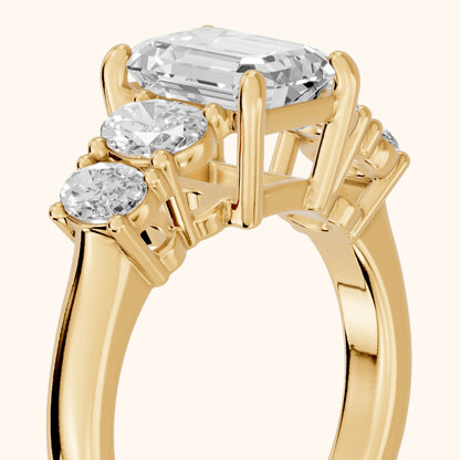 Judith Statement Five-Stone Emerald Diamond Engagement Ring in Yellow Gold - slant-view.webp