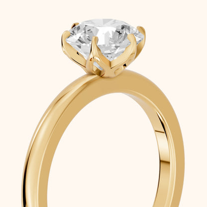 Serena Blossom Solitaire Round Diamond Engagement Ring in Yellow Gold - slant-view.webp