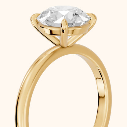 Lyla Petite Solitaire Round Diamond Engagement Ring in Yellow Gold - slant-view.webp