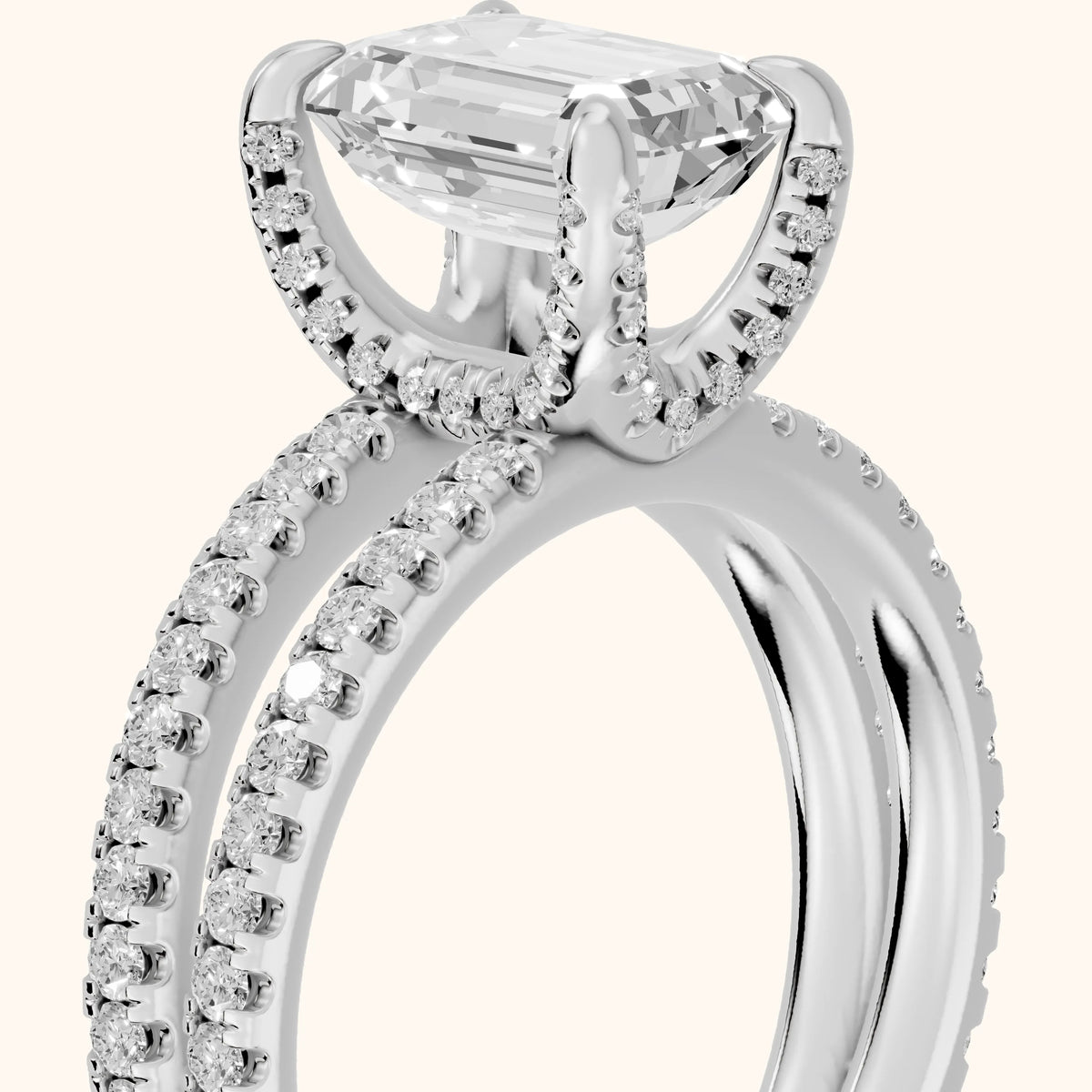 Briony Hidden Halo Split Shank Emerald Diamond Engagement Ring in White Gold - slant-view.webp
