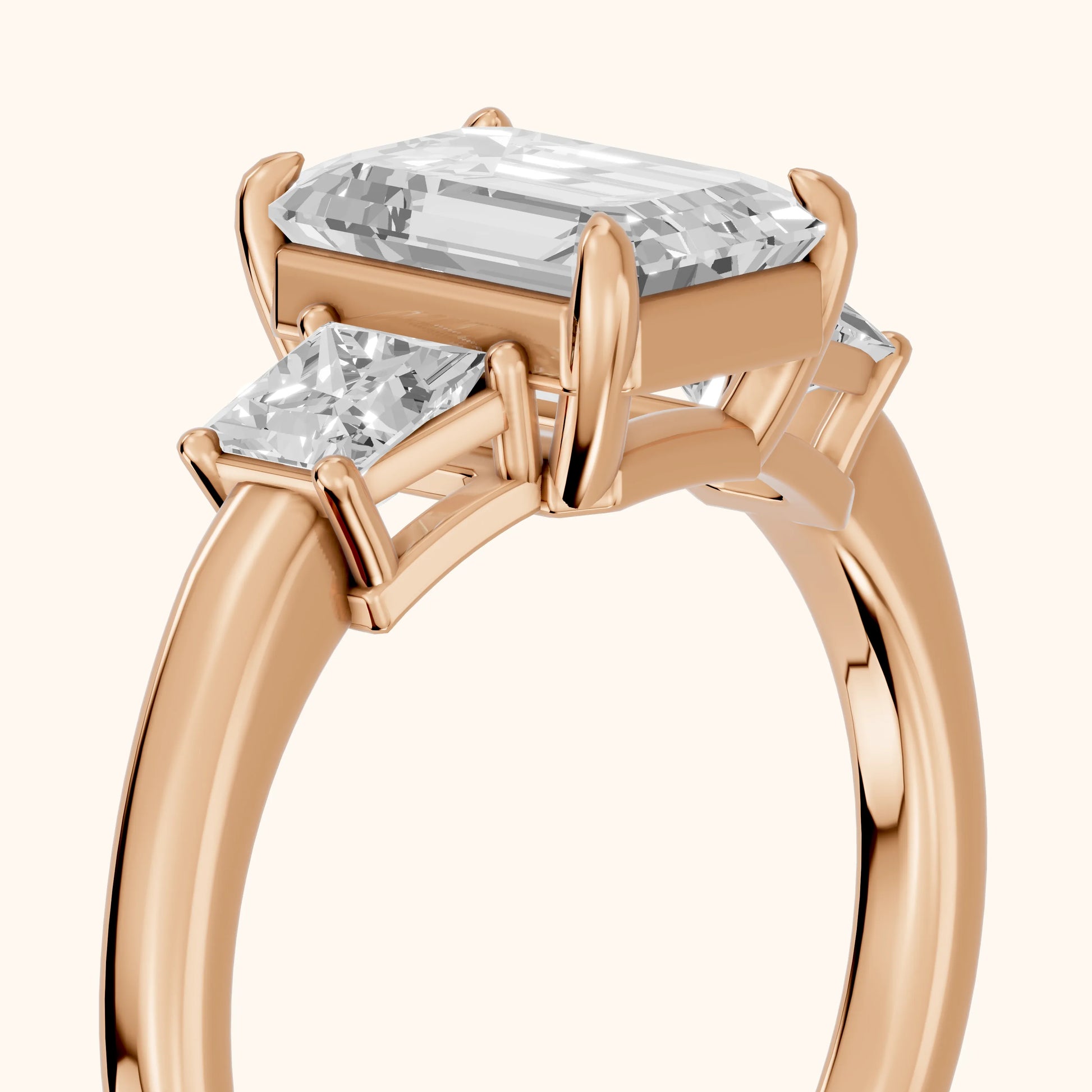 Selena Three-Stone Basket Emerald Diamond Ring in Rose Gold - slant-view.webp