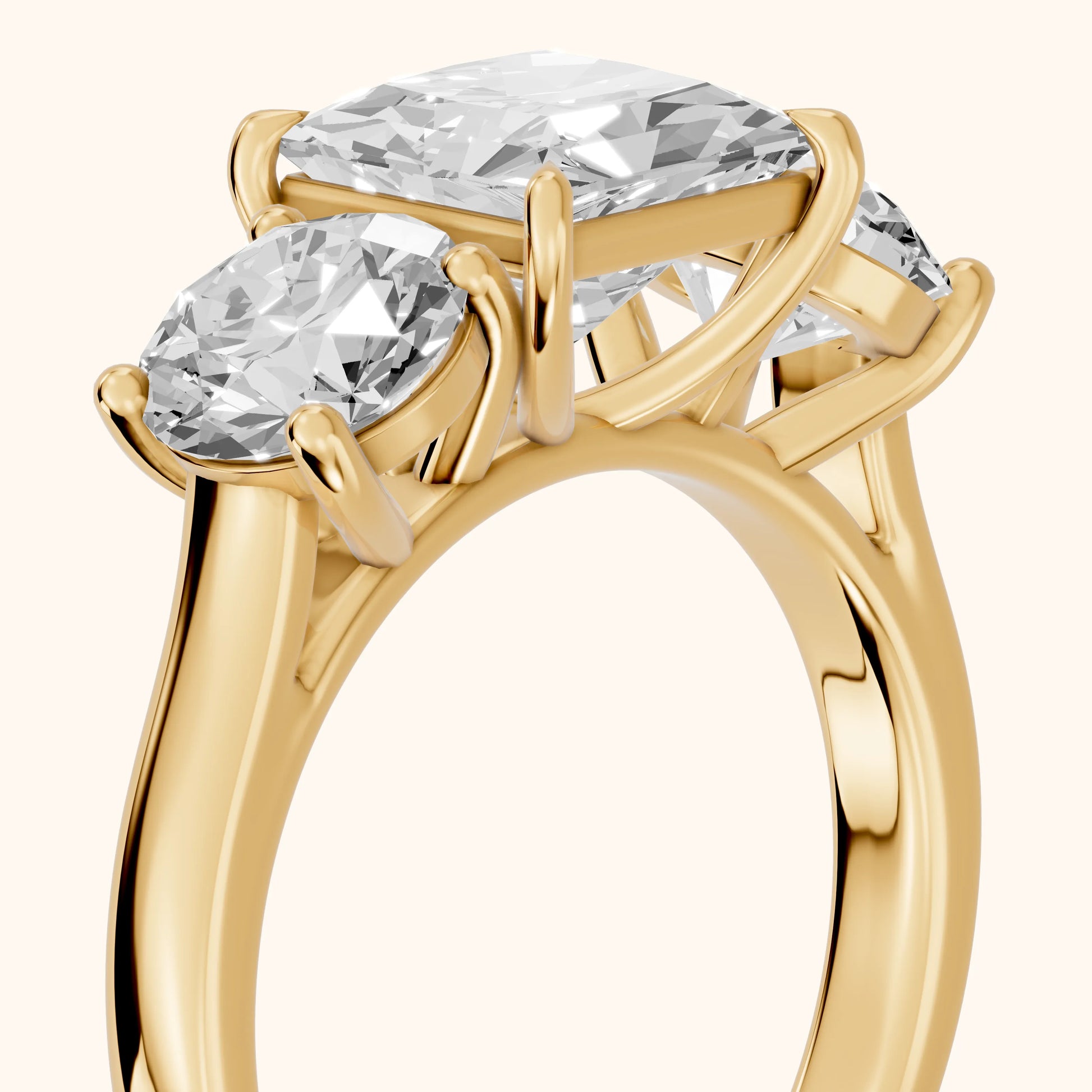 Esme Three-Stone Tapered Princess Diamond Ring in Yellow Gold - slant-view.webp