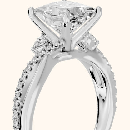 Reno Pear-Side Twist Princess Diamond Engagement Ring in Platinum - slant-view.webp