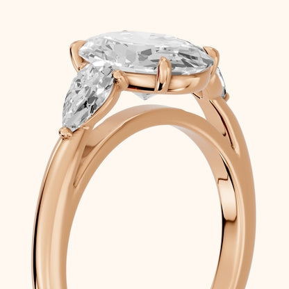 Phoebe Three-Stone Oval Diamond Ring in Rose Gold - slant-view.webp