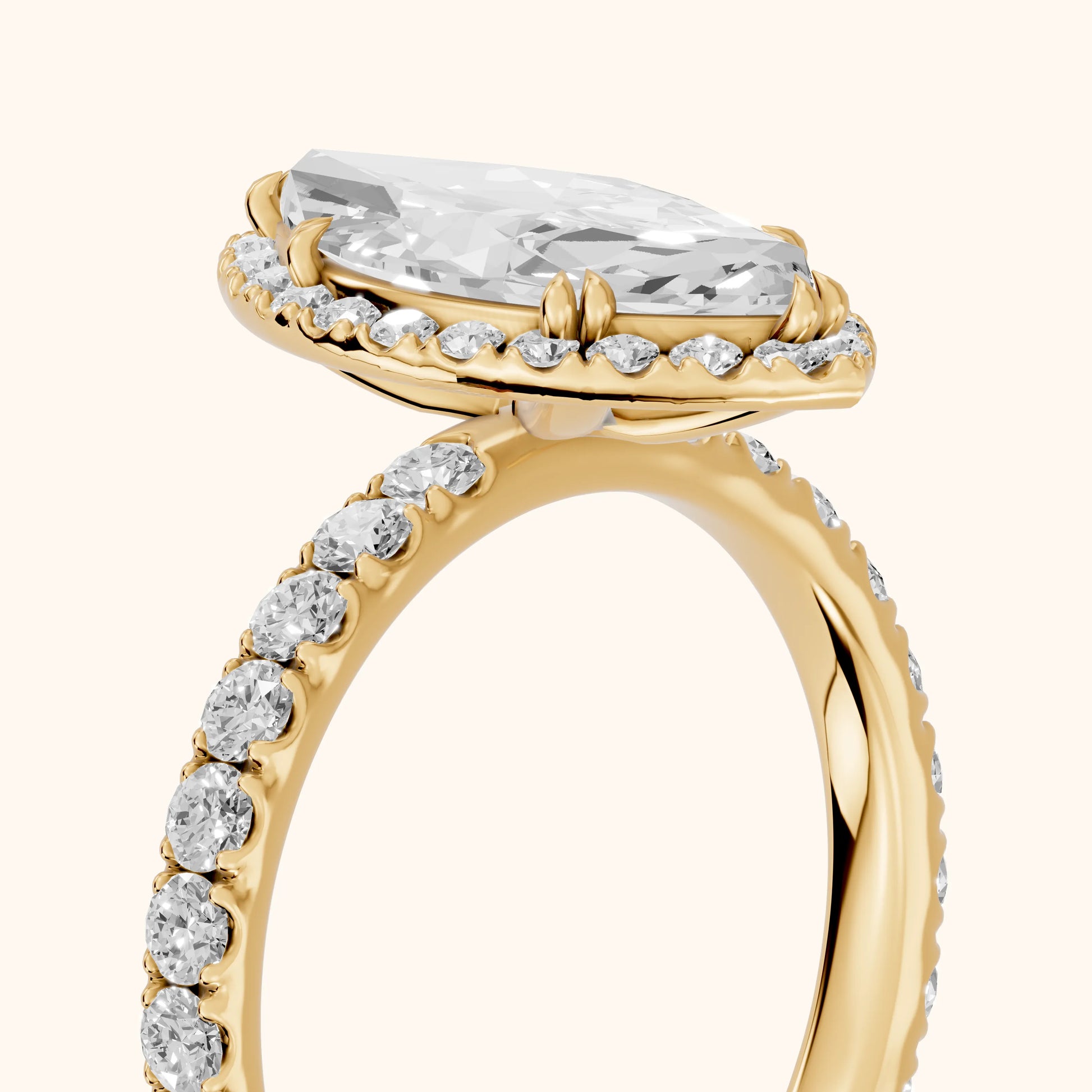 Chloe Halo Pavé Marquise Diamond Ring in Yellow Gold - slant-view.webp