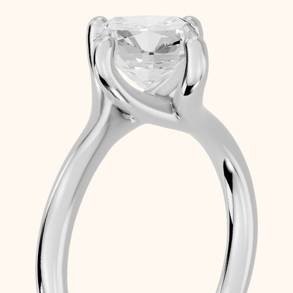 Clio Bypass Solitaire Cushion Diamond Engagement Ring in Platinum - slant-view.webp
